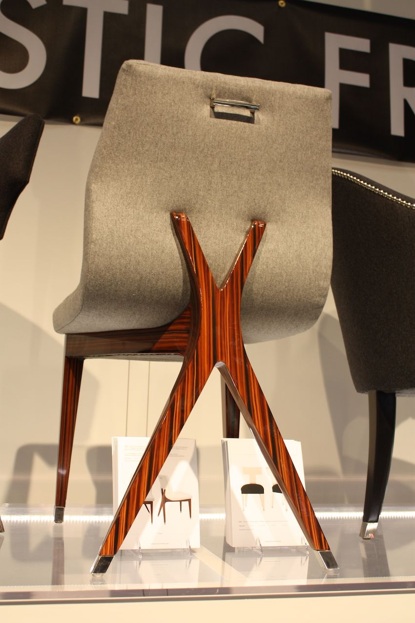One of Artistic Frame's new dining chairs has this interesting X shape on the wood back. Considering that you most often see the backs of your chairs around the dining table, we think this is great.