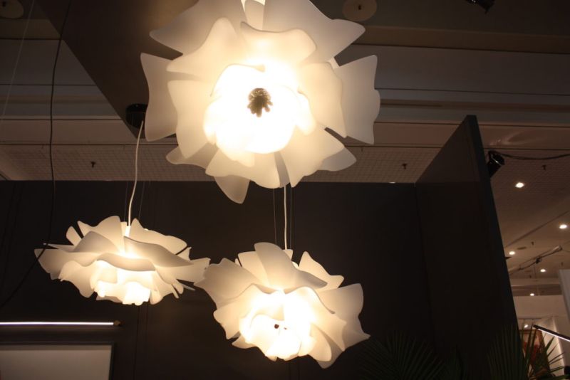 Juniper Design's Love Me Not Light fixture is made from five layers of hand-formed, porcelain-finish acrylic. It can be suspended singly in a cluster. Artist Pascale Girardin was inspired to create it by childhood memories of picking petals off a daisy.